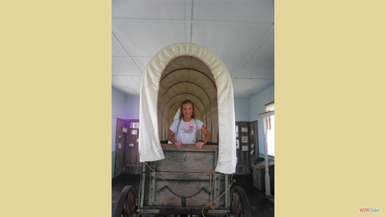 Abby in covered wagon