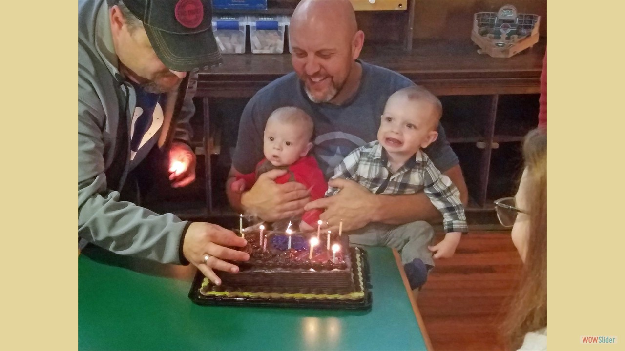 Mike with grandkids, Caydon and Sutton