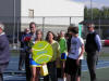 Emma with Mom and Dad for senior day at tennis match