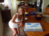 Emma with graduation cake